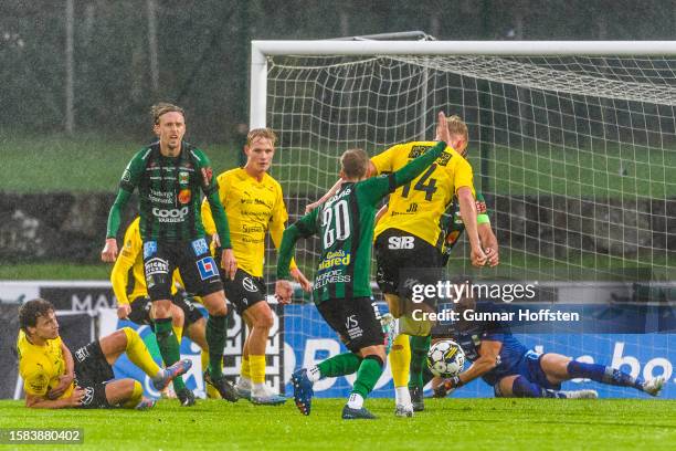 Tom Pettersson of Mjällby, Oliver Silverholt of Varberg and goalkeeper Stojan Lucic of Varberg in action during the Allsvenskan match between...