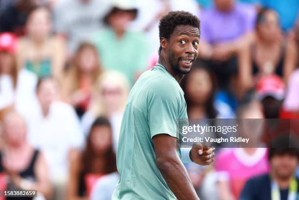 Gael Monfils of France reacts after winning a point against Christopher Eubanks of the United States during Day One of the National Bank Open, part...