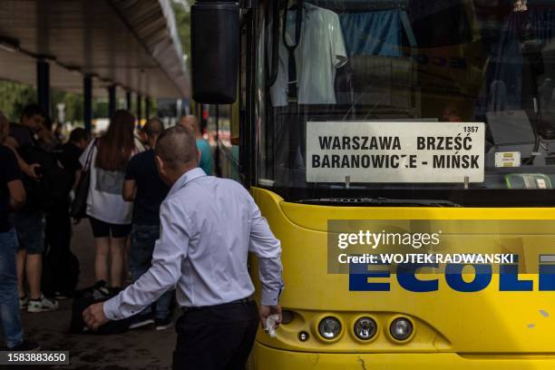 Bus driver boards the bus to Minsk, Belarus, at Warsaw West bus station on July 21, 2023. Strongman Alexander Lukashenko violently put down historic...