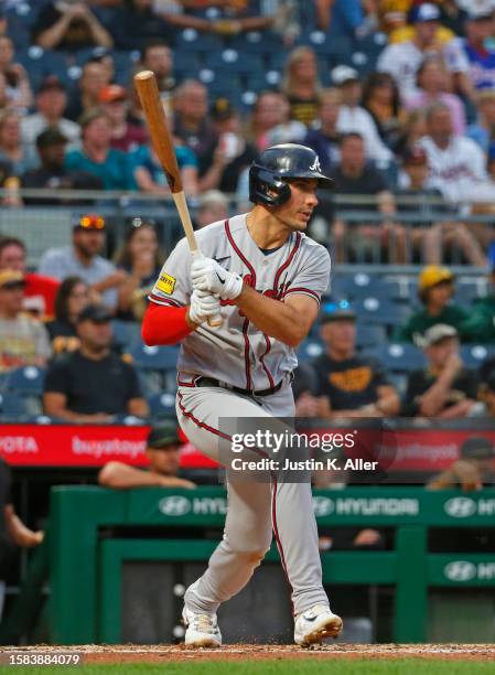 Matt Olson of the Atlanta Braves hits an RBI single in the fourth inning against the Pittsburgh Pirates during the game at PNC Park on August 7, 2023...