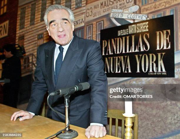 Film director Martin Scorsese poses for photographs 21 January in Mexico City before a press conference to present his movie "Gangs of New York,"...