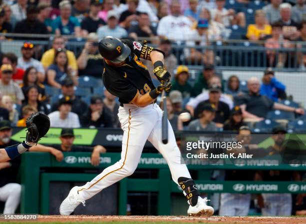 Jared Triolo of the Pittsburgh Pirates hits a two RBI single in the third inning against the Atlanta Braves during the game at PNC Park on August 7,...