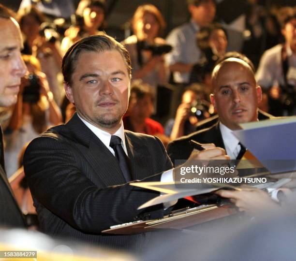 Actor Leonardo DiCaprio arrives at a theatre in Tokyo on July 20, 2010 for the Japanese premiere of his latest film "Inception". AFP PHOTO /...