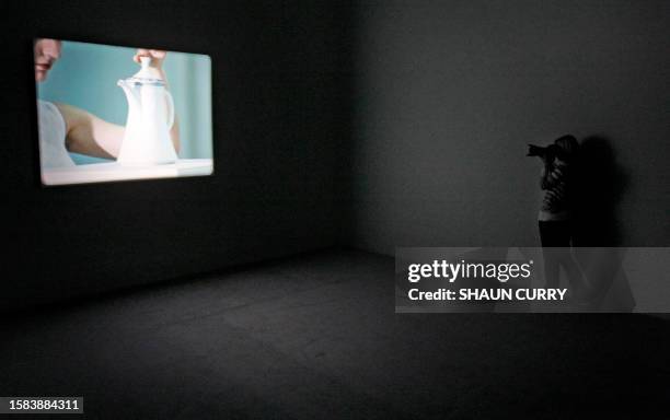 Photographer takes pictures of Bangladeshi artist Runa Islams' film entitled "Be The First To See What You See As You See It" during a press view for...