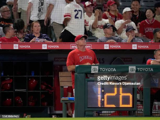 Manager Phil Nevin of the Los Angeles Angels reacts during the ninth inning against the San Francisco Giants at Angel Stadium of Anaheim on August 7,...