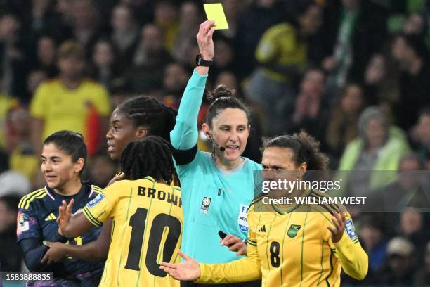Australian referee Kate Jacewicz shows a yellow card to Jamaica's midfielder Drew Spence during the Australia and New Zealand 2023 Women's World Cup...