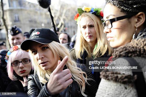 Activists of the Ukrainian women movement Femen demonstrate near the Egyptian embassy in Paris on December 15, 2012 to support Aliaa Magda Elmahdy,...