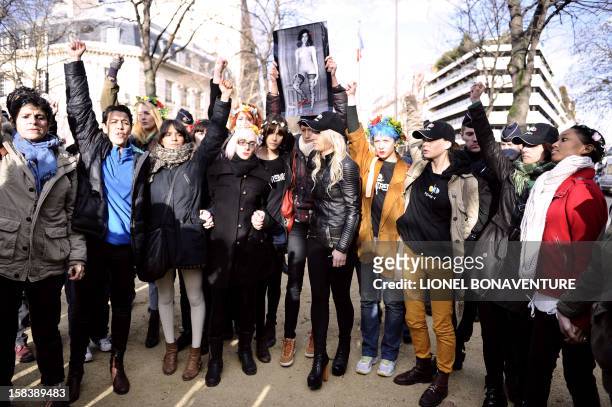 Activists of the Ukrainian women movement Femen demonstrate near the Egyptian embassy in Paris on December 15, 2012 to support Aliaa Magda Elmahdy,...