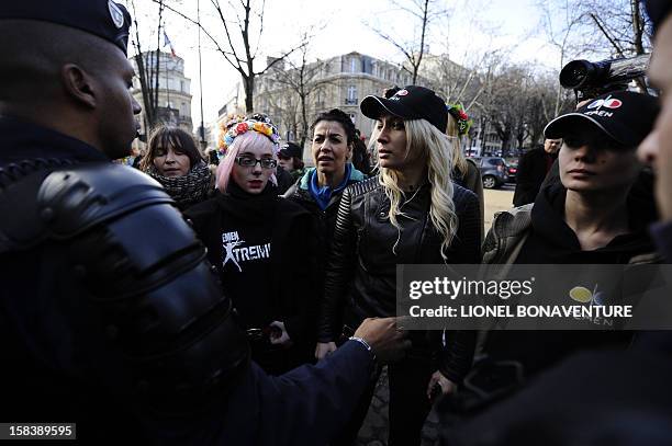 Activists of the Ukrainian women movement Femen demonstrate near the Egyptian embassy in Paris on December 15, 2012 to support Aliaa Magda Elmahdy,...