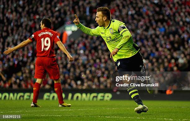 Andreas Weimann of Aston Villa celebrates after scoring the second goal during the Barclays Premier League match between Liverpool and Aston Villa at...