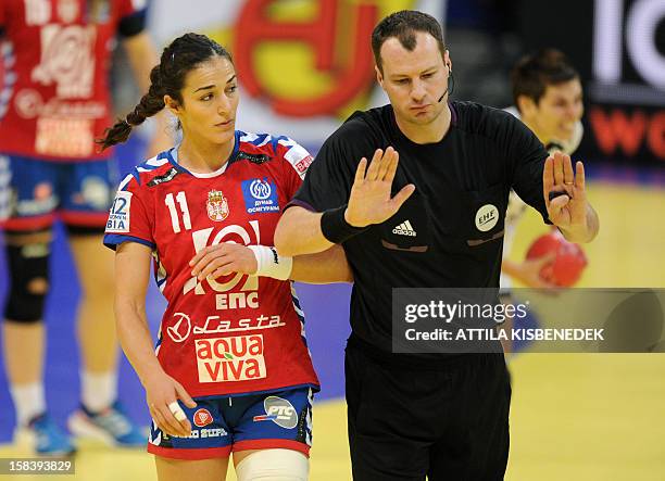 Serbia's Sanja Damnjanovic reacts as she is disciplined by Latvian referee Renars Licis with two minute penalty on December 15 , 2012 during a...