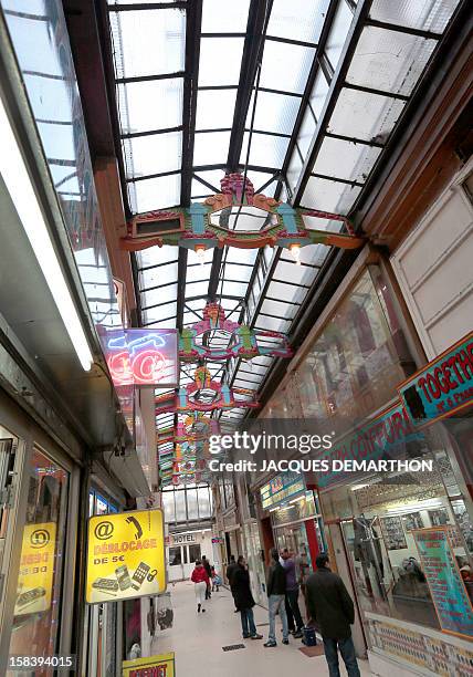 Picture taken on December 15, 2012 in Paris, shows the "Passage du Prado" , which leads to the Saint-Denis boulevard. The Paris typical passages were...