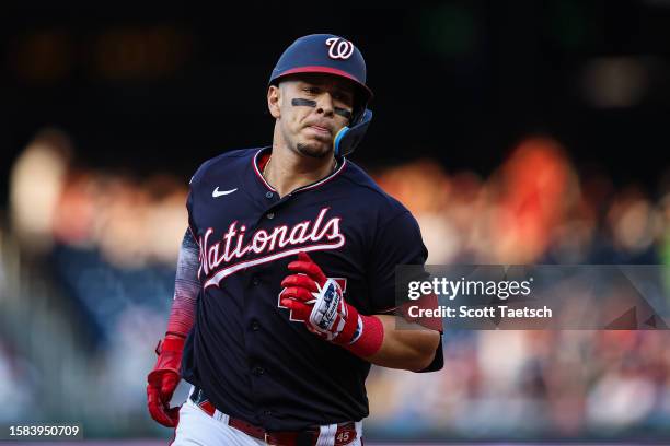 Joey Meneses of the Washington Nationals rounds the bases after hitting a home run against the Milwaukee Brewers during the second inning at...