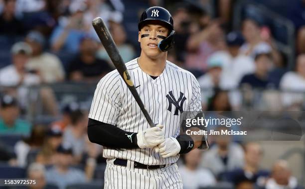 Aaron Judge of the New York Yankees looks on after drawing a walk during the third inning against the Tampa Bay Rays at Yankee Stadium on July 31,...