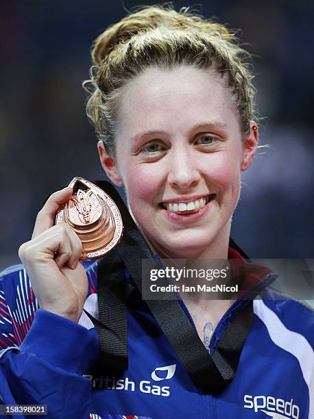 Hannah Miley of Great Britain poses with her bronze medal from the women's 200m individuval medley final during day four of the 11th FINA Short...