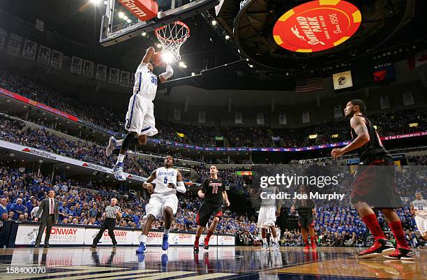 Stephens of the Memphis Tigers dunks the ball against the Louisville Cardinals on December 15, 2012 at FedExForum in Memphis, Tennessee.