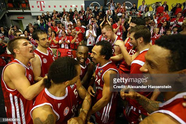 Players of Muenchen celebrate victory with their supporters after winning the Beko Basketball match between FC Bayern Muenchen and Walter Tigers...