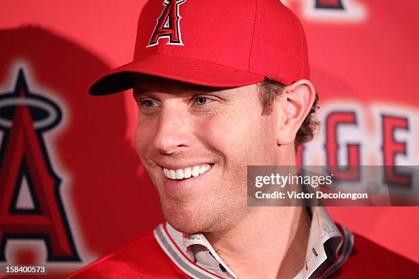 Josh Hamilton of the Los Angeles Angels of Anaheim smiles during the press conference introducing Hamilton as the team's newest member at ESPN Zone...