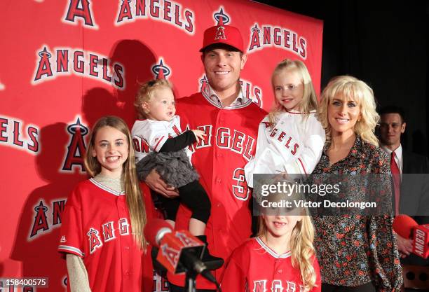 Josh Hamilton of the Los Angeles Angels of Anaheim stands with his family, , Julia, Stella , Sierra, Michaela Grace and wife Katie for a group photo...