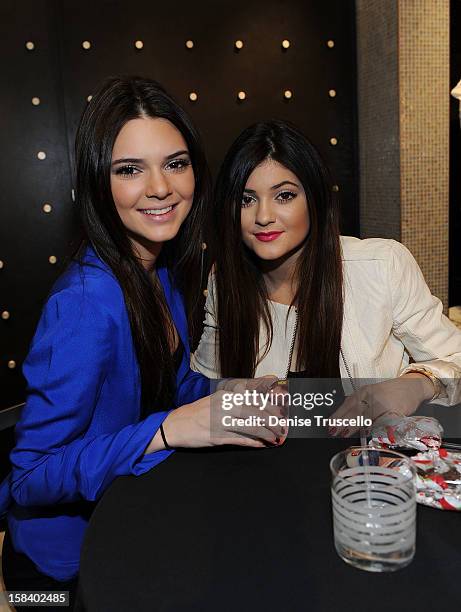 Kendall Jenner and Kylie Jenner visits the Kardashian Khaos store at The Mirage Hotel and Casino on December 15, 2012 in Las Vegas, Nevada.