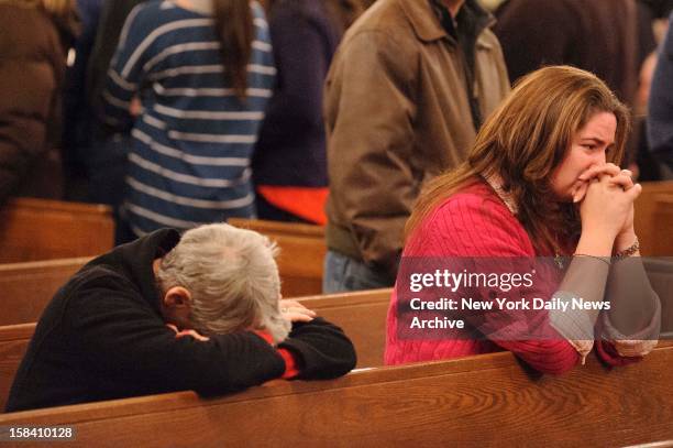 Prayer vigil at St. Rose of Lima Roman Catholic Church after a mass murderer, identified by authorities as Adam Lanza, opened fire inside Sandy Hook...