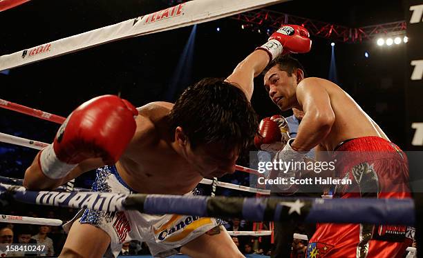 Nonito Donaire of the Philippines knocks out Jorge Arce of Mexico in the third round of their WBO World Super Bantamweight bout at the Toyota Center...