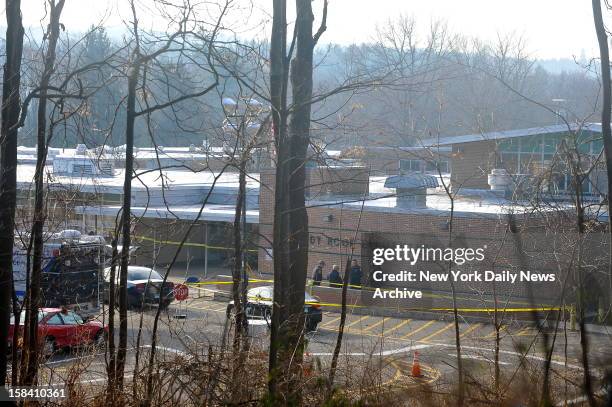 Sandy Hook Elementary School a day after Adam Lanza opened fire inside school killing 27 people, including 20 children.