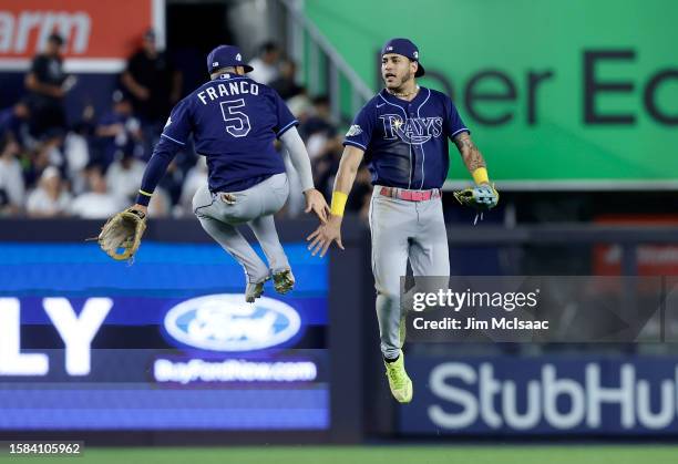 Wander Franco and Jose Siri of the Tampa Bay Rays celebrate after defeating the New York Yankees at Yankee Stadium on July 31, 2023 in Bronx borough...