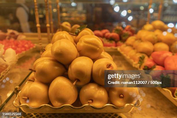 close-up of fruits for sale in market - close up of chocolates for sale fotografías e imágenes de stock