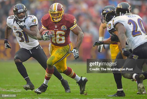 Washington's running back Alfred Morris makes a 3rd quarter gain during the Washington Redskins defeat of the Baltimore Ravens 31 - 28 at FedEx Feild...