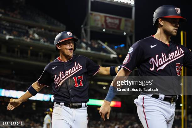 Alex Call of the Washington Nationals celebrates after scoring a run against the Milwaukee Brewers during the seventh inning at Nationals Park on...