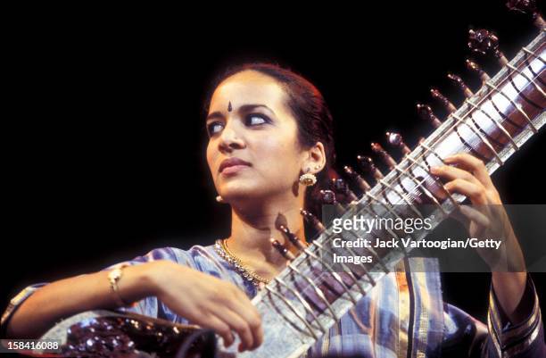 British musician Anoushka Shankar plays sitar on stage at the Central Park SummerStage, New York, New York, August 15, 2000. She is the daughter of...