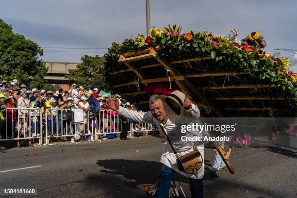 People take part in the parade 'La Feria de Las Flores' recognized as Colombia's cultural heritage in Medellin on August 07, 2023. The most...