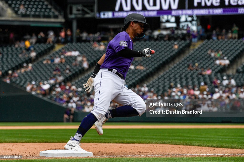 Colorado Rockets Basketball Ezequiel Tovar of the Colorado Rockies runs to score from second base ...