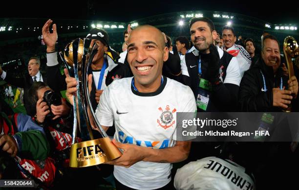 Emerson of Corinthians celebrates with the trophy after winning the FIFA Club World Cup Final Match between Corinthians and Chelsea at the...