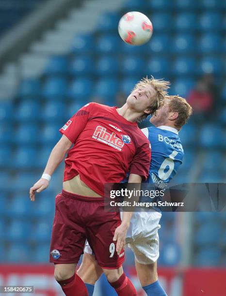 Philipp Hoffmann of Paderborn and Lukas Sinkiewicz of Bochum jump for the ball during the Second Bundesliga match between VfL Bochum and SC Paderborn...