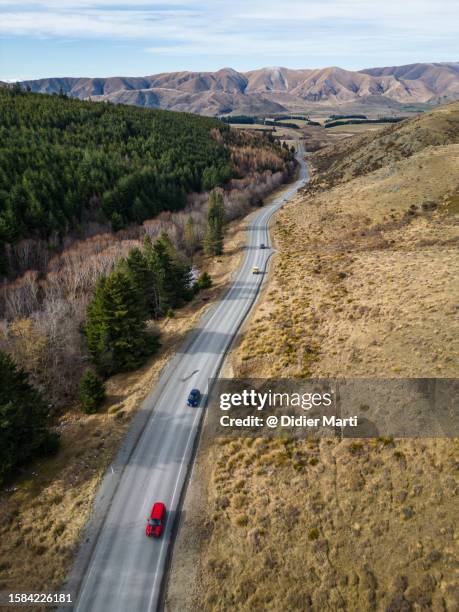 burkes pass road in new zealand - didier marti stock pictures, royalty-free photos & images