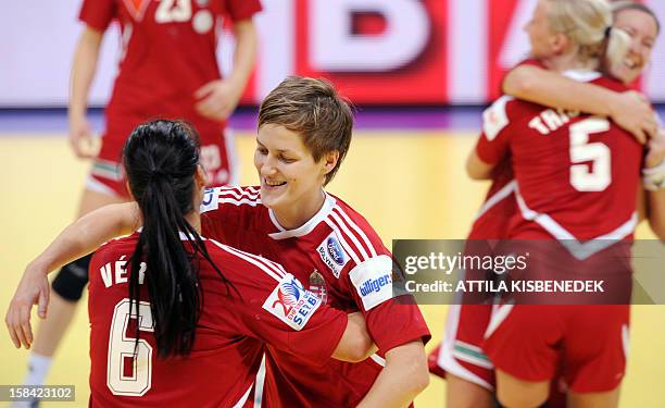 Hungary's players Orsolya Verten and Zsuzsanna Tomori celebrate their team's victory at the end of the 2012 EHF European women's Handball...