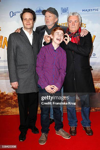 August Diehl, Michael Gwisdek, Leon Seidel and Henry Huebchen attend 'Die Abenteuer des Huck Finn' Germany Premiere on December 16, 2012 in Berlin,...