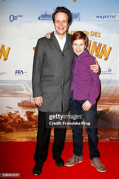 Leon Seidel and August Diehl attend 'Die Abenteuer des Huck Finn' Germany Premiere on December 16, 2012 in Berlin, Germany.