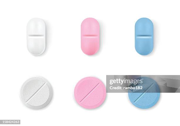 different colored pills in a row - pill stock illustrations