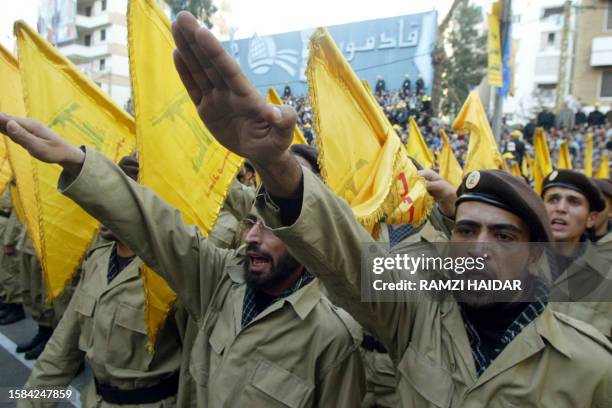 Members of Lebanon's Shiite Muslim militant group Hezbollah parade in the streets of the southern suburbs of Beirut to mark Jerusalem Day 21 November...