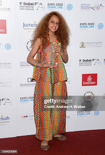 Actress Waad Mohammed with the Muhr Arab Feature Best Actress award during the Closing Ceremony on day eight of the 9th Annual Dubai International...