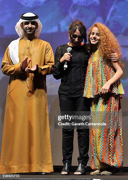 Sheikh Mansoor bin Mohammed bin Rashid Al Maktoum, Director Haifaa Al Mansour and actress Waad Mohammed on stage during the Closing Ceremony on day...