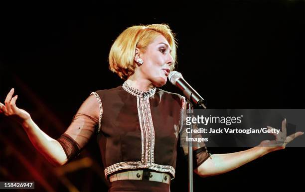 Iranian singer and actress Faegheh Atashin, who uses the stage name Googoosh, performs at Nassau Coliseum, Uniondale, New York, August 26, 2000.