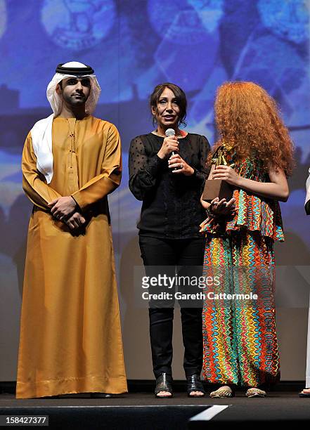 Sheikh Mansoor bin Mohammed bin Rashid Al Maktoum, Director Haifaa Al Mansour and actress Waad Mohammed on stage during the Closing Ceremony on day...