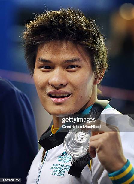 Kenneth To of Australia poses with his silver medal from the Men's 10m individual medley during day five of the 11th FINA Short Course World...