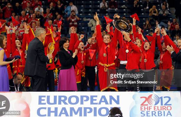 Montenegro handball team celebrate their gold medal win during the Women's European Handball Championship 2012 medal ceremony at Arena Hall on...