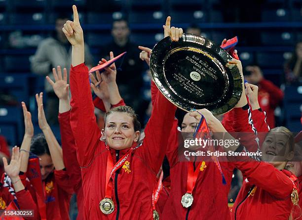 Montenegro handball team celebrate with the trophy during the Women's European Handball Championship 2012 medal ceremony at Arena Hall on December...