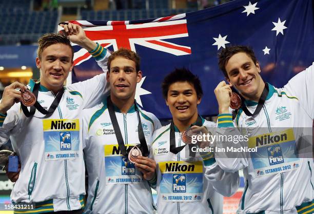 Robert Hurley, Grant Irvine, Kenneth To and Tommaso D'Orsogna of Australia pose with their silver medals from the Men's 4x100m Medley Relay during...